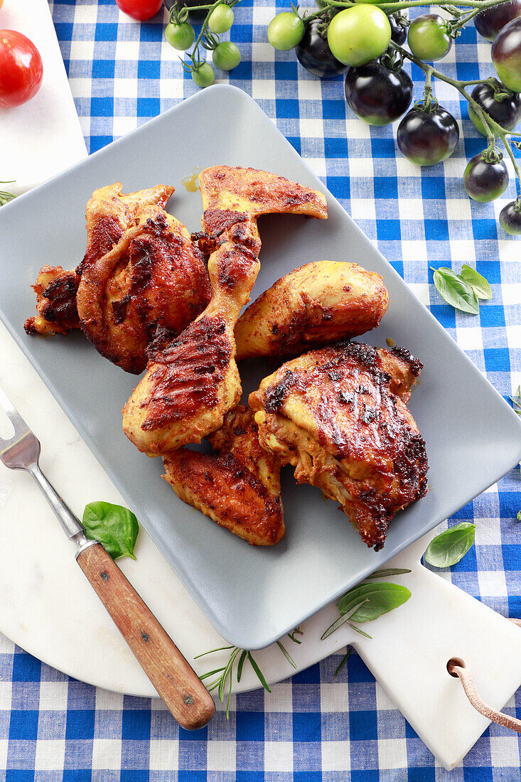 Grilled chicken drumsticks, thighs, and wings