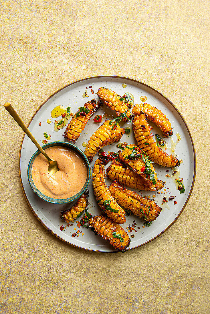 Corn ribs with chilli oil and siracha mayo