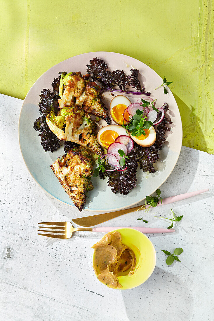 Baked romanesco broccoli with miso butter and soya eggs