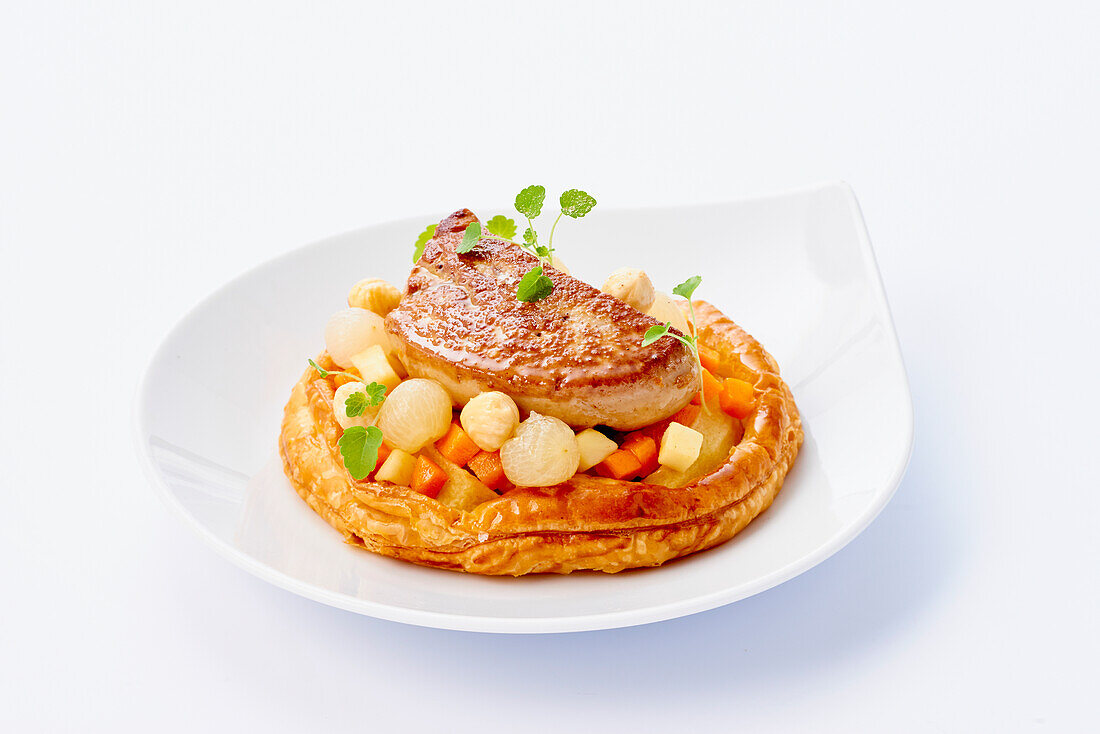 Foie gras with silver onions on puff pastry