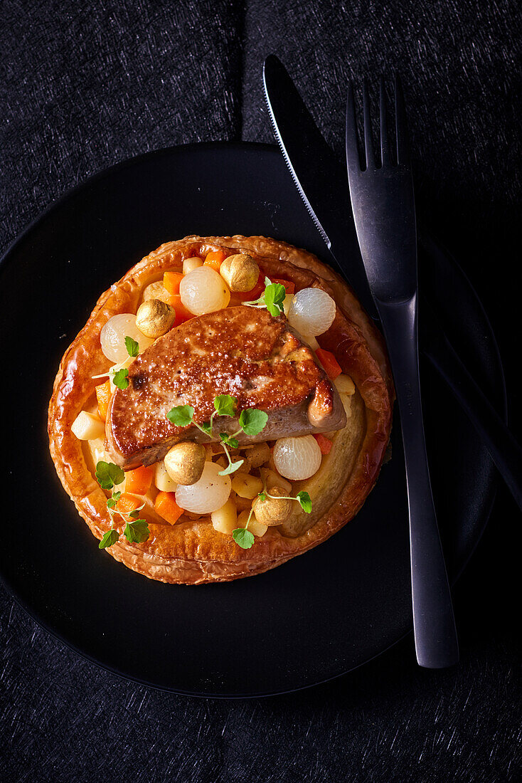 Foie gras with silver onions on puff pastry