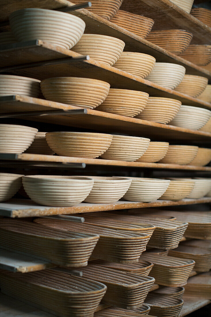 Shelf with proofing baskets in a bakery