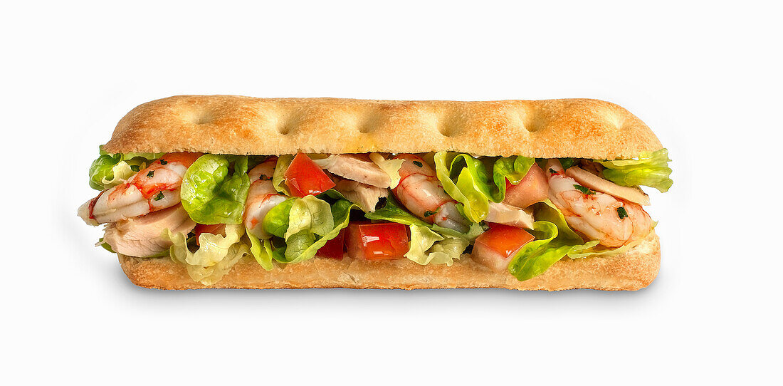 A sub sandwich with tuna and prawns