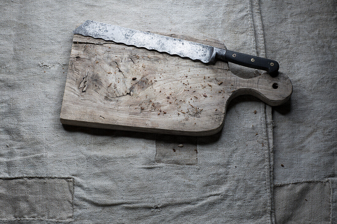 Cutting board and a bread knife