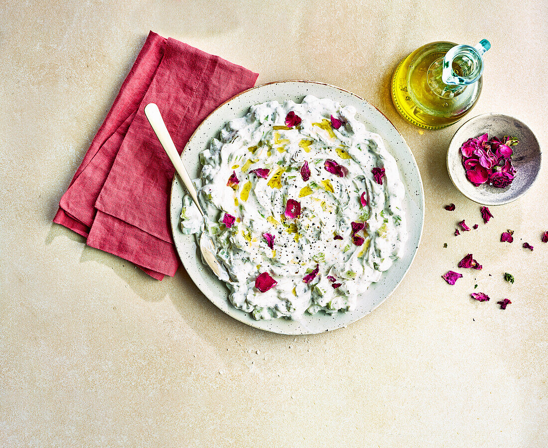 Mast-o-khiar (Iranian appetizer of yogurt and cucumber with olive oil and rose petals)