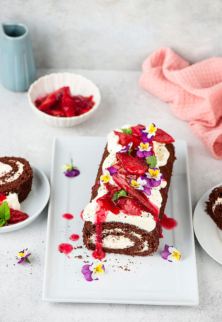 Chocolate sponge cake roll with rhubarb