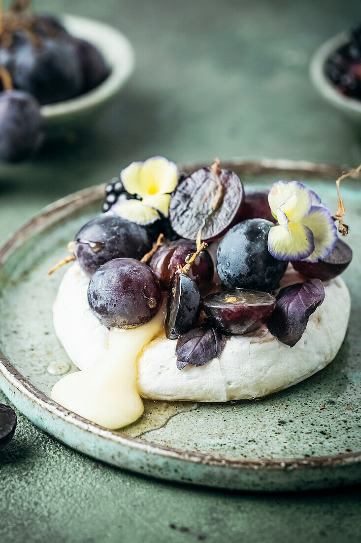 Baked camembert with blue grapes