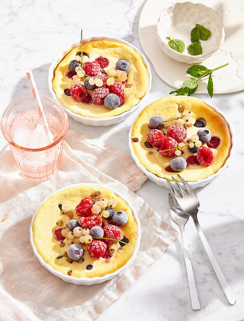 Baked curd dessert with frozen fruit