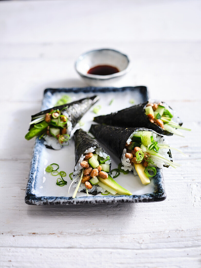 Vegetarian temaki sushi with avocado and natto (Japan)