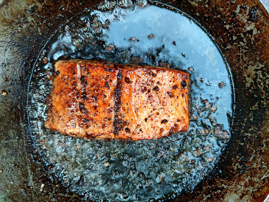 Fried salmon in a pan