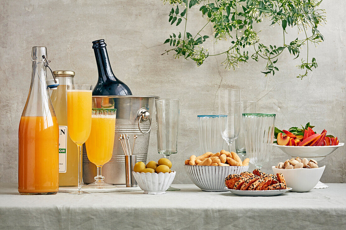 Bellini with ingredients and snacks