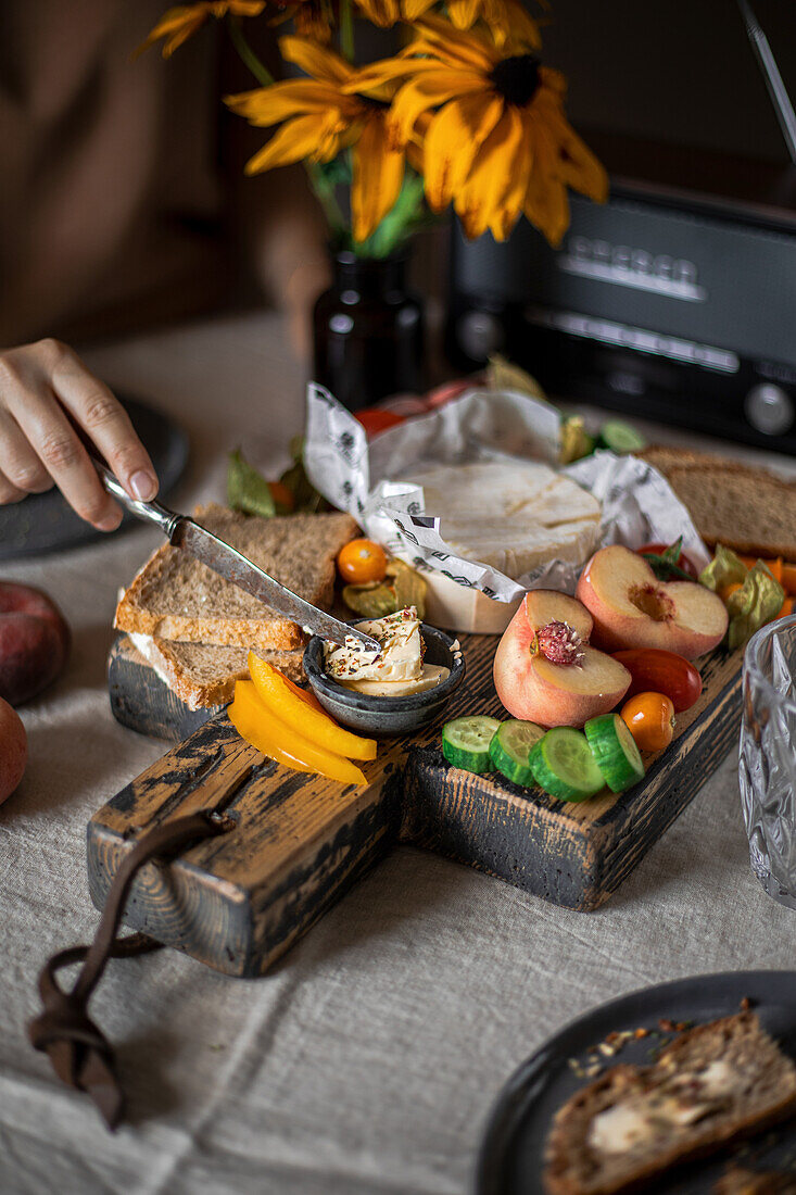 Autumn breakfast with homemade bread served on wooden board