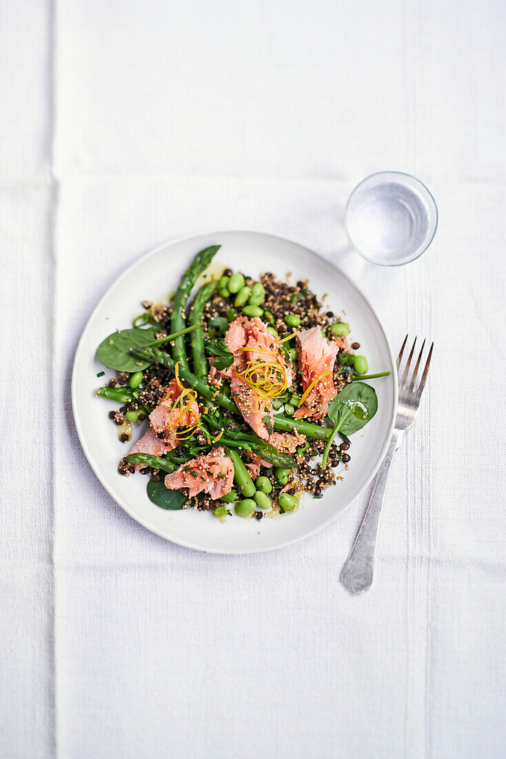 Roasted quinoa salad with lentils, green asparagus, and poached salmon