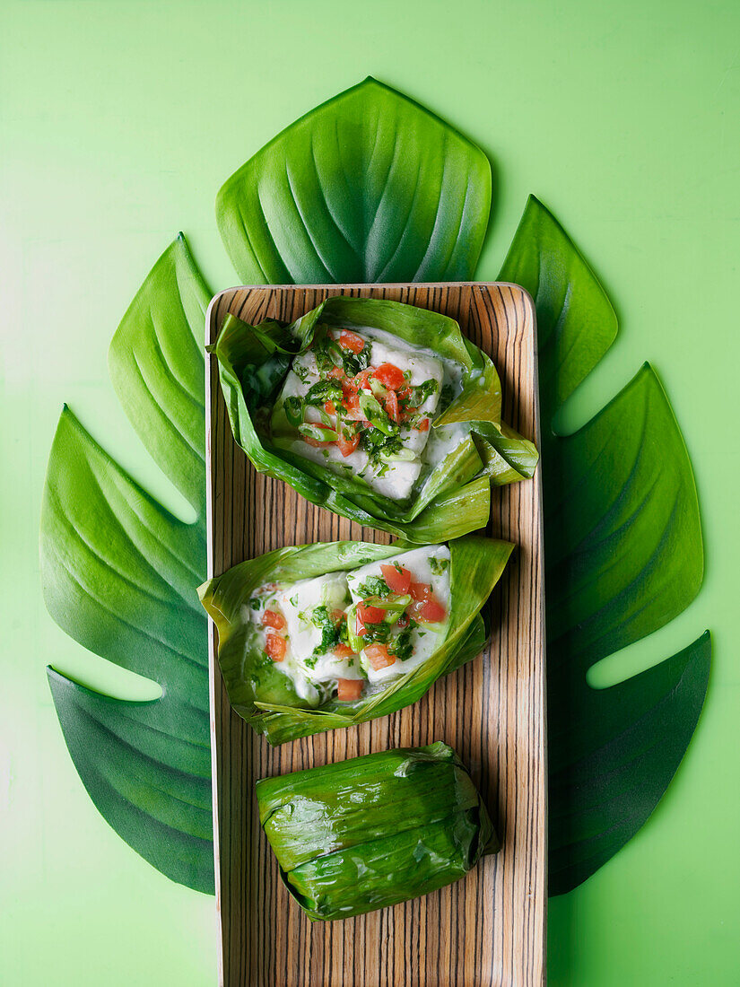 Fish baked in banana leaf