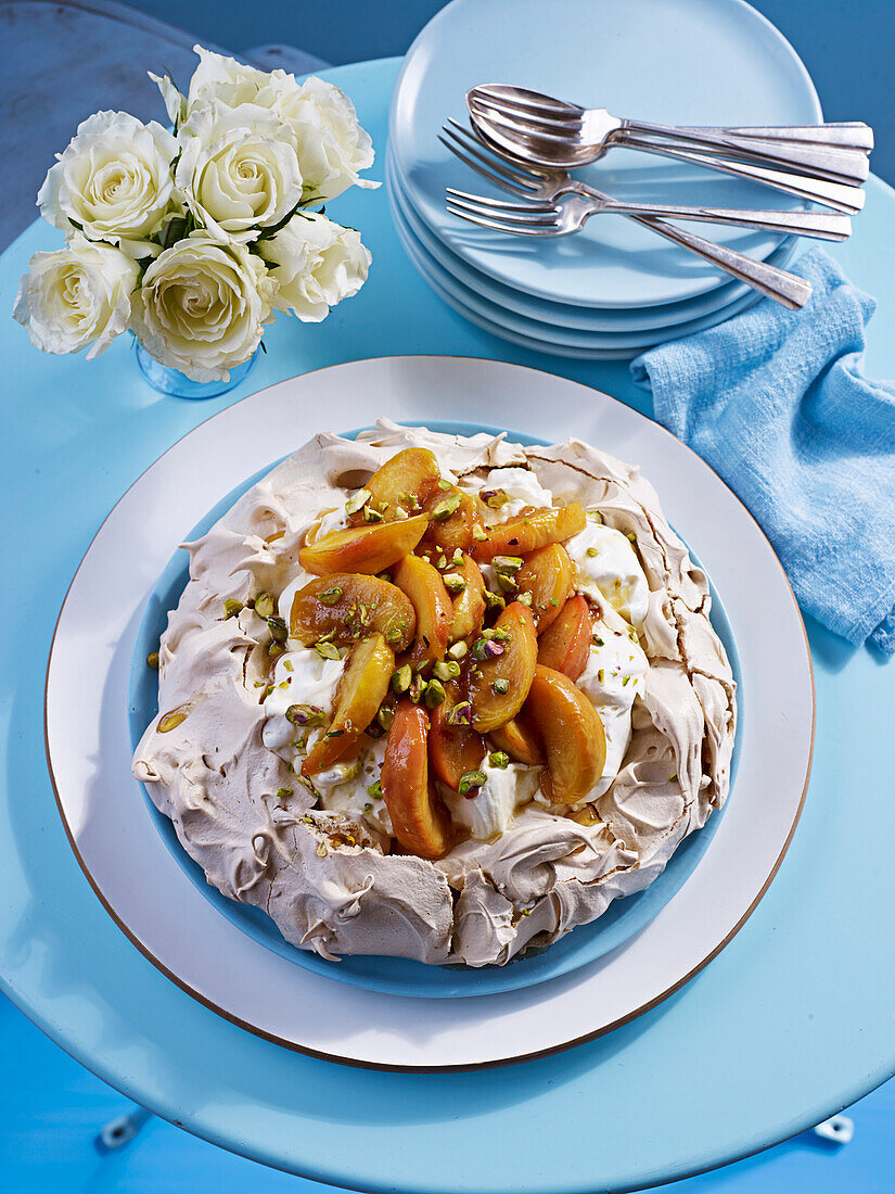 Peach-pistachio pavlova with honey