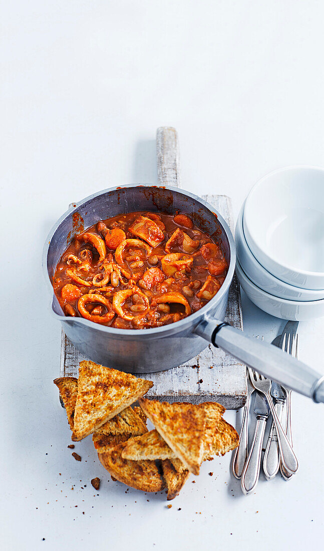 Squid stew with tomatoes