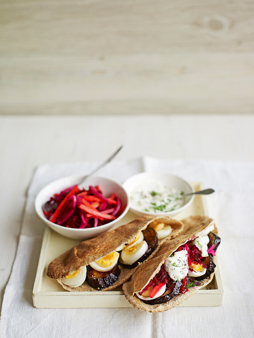 Vegetarian pittas with hard boiled eggs and beets