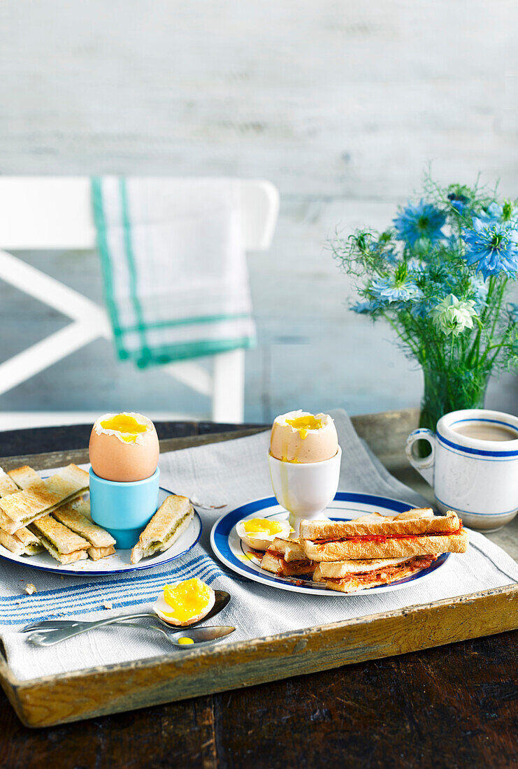 Soft boiled eggs with chorizo soldiers
