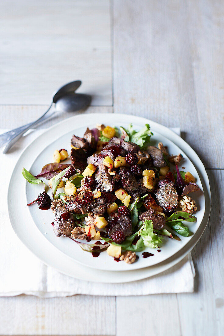 Sauteed liver and apple with blackberry dressing