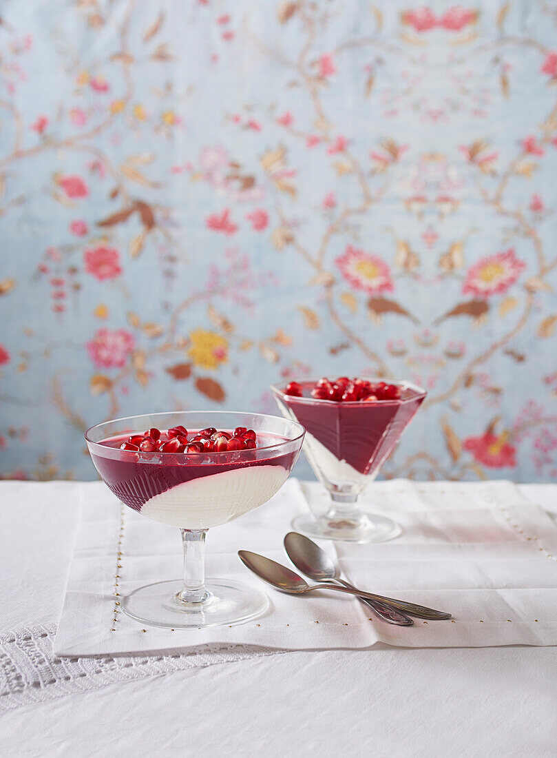 Creamy yoghurt and vanilla panna cotta with raspberry pomegranate jelly