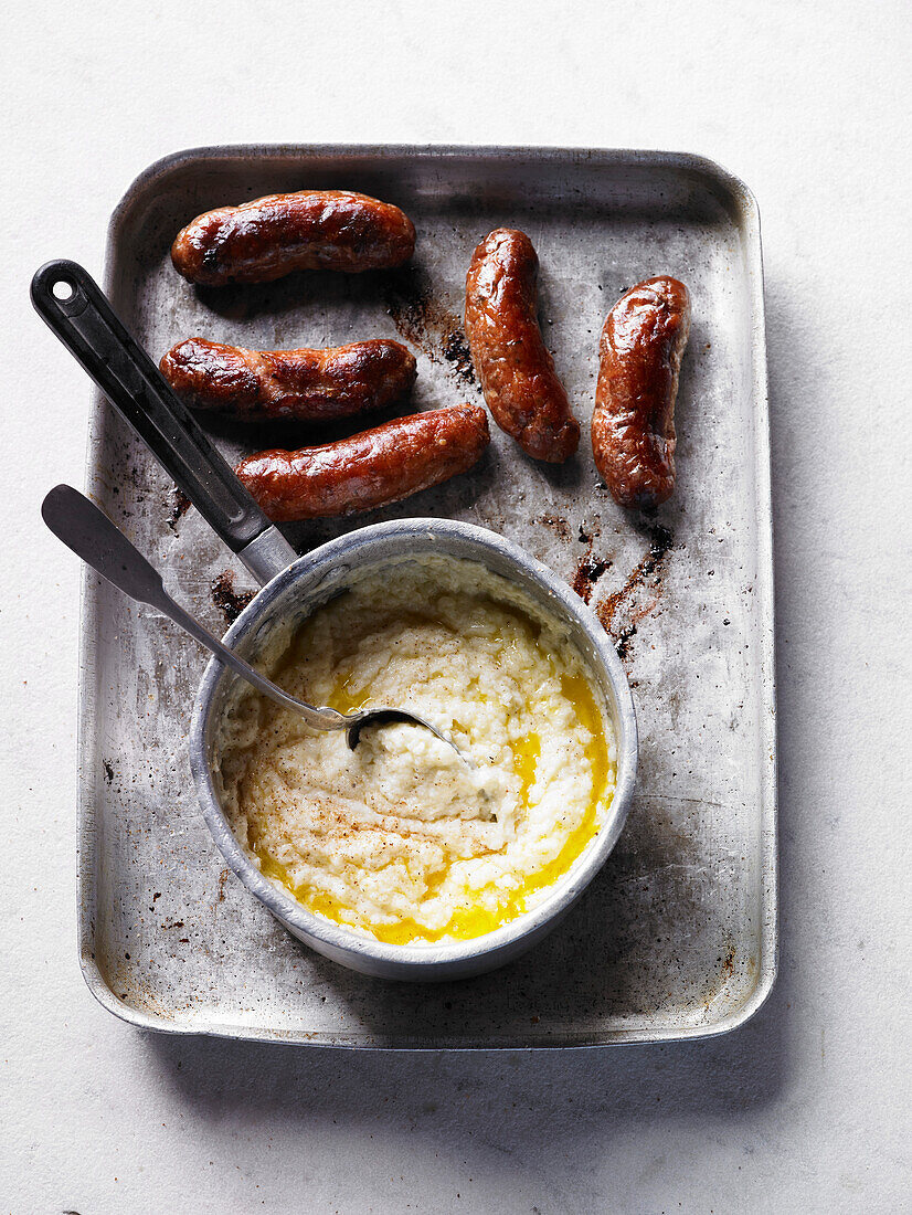 Cauliflower cheese puree with thyme and sausages
