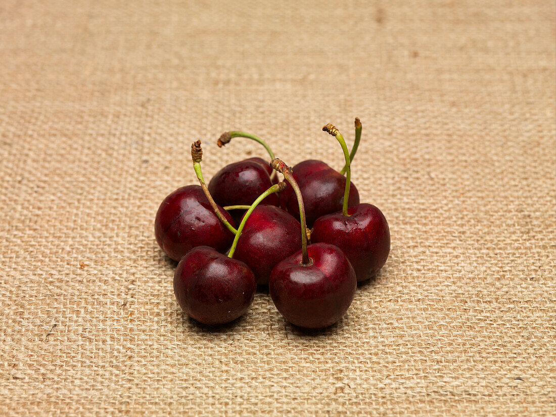 Penny cherries on burlap