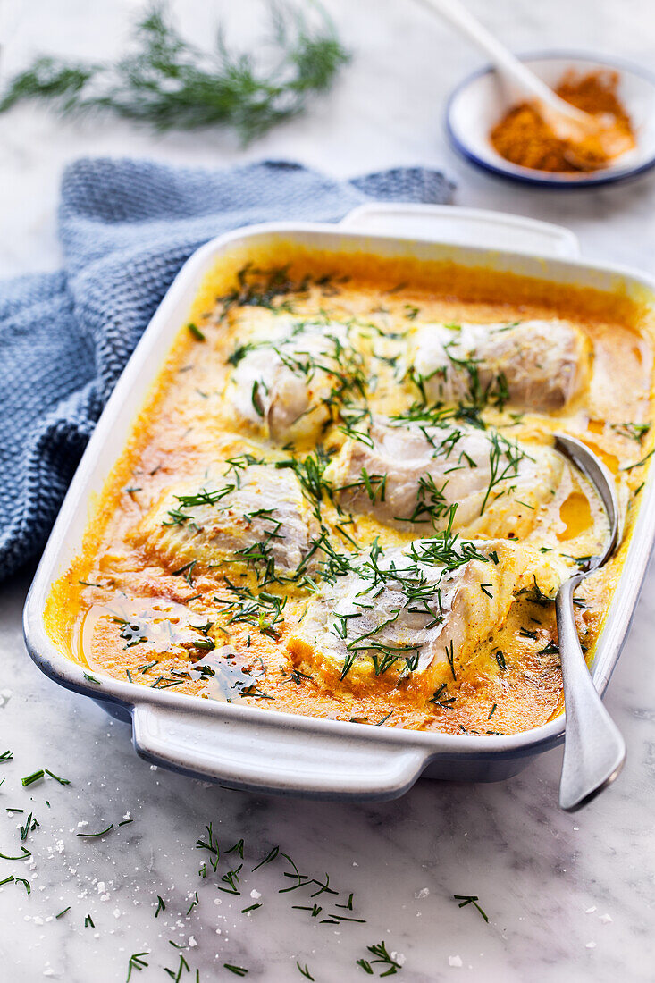 Fischgratin mit Sahne und Curry