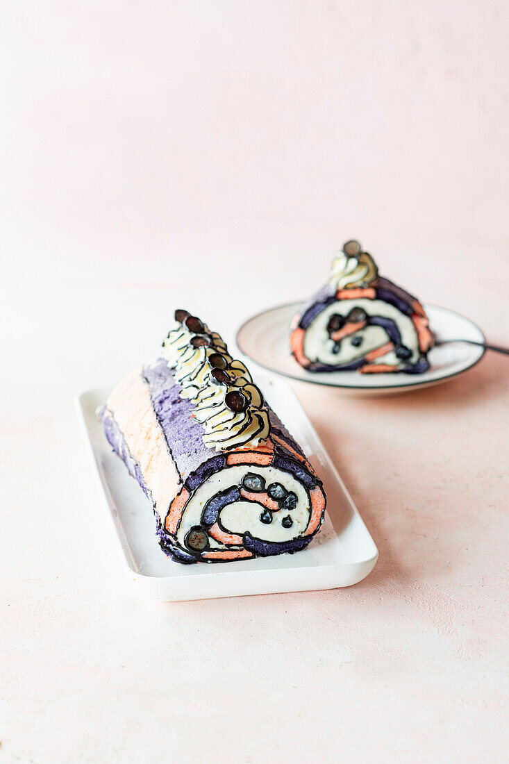 Japanese sponge roll with cream and berries (comic cake)