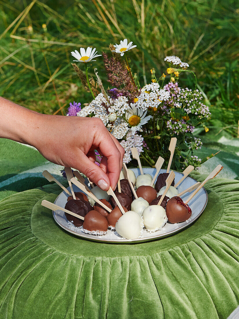 Berry skewers dipped in chocolate