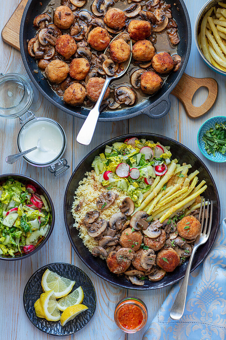 Turkey meatballs with mushroom sauce, cous cous, veggies