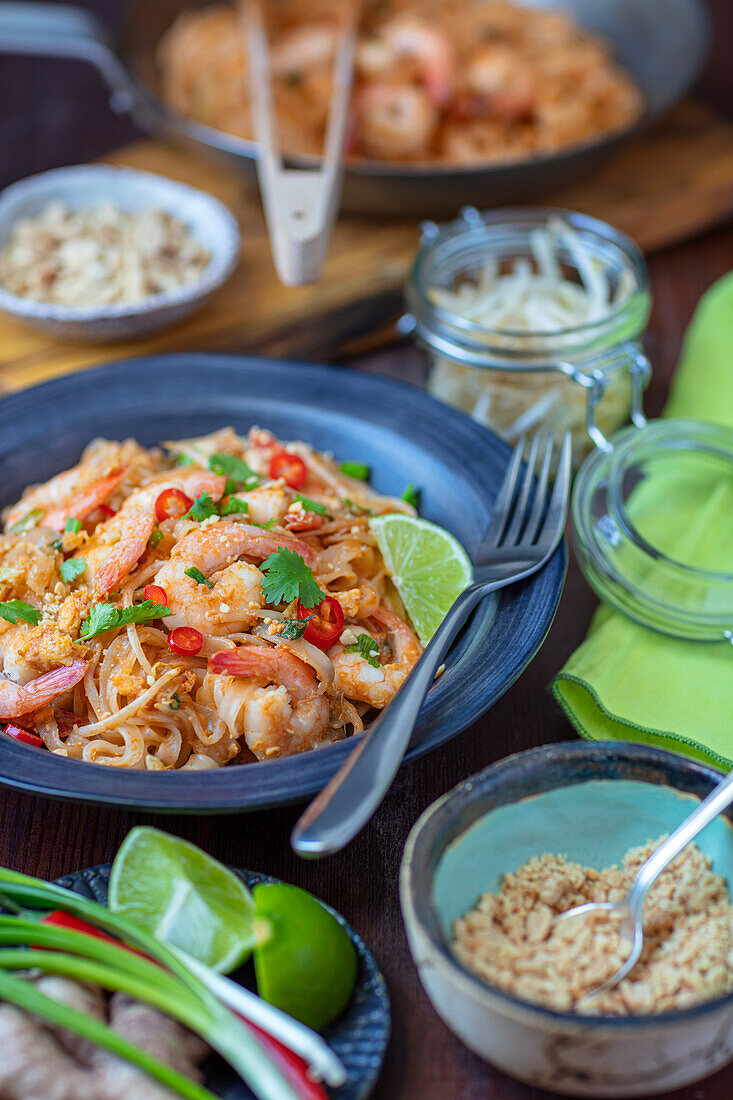 Noodles with shrimps and peanuts, pad thai with shrimps