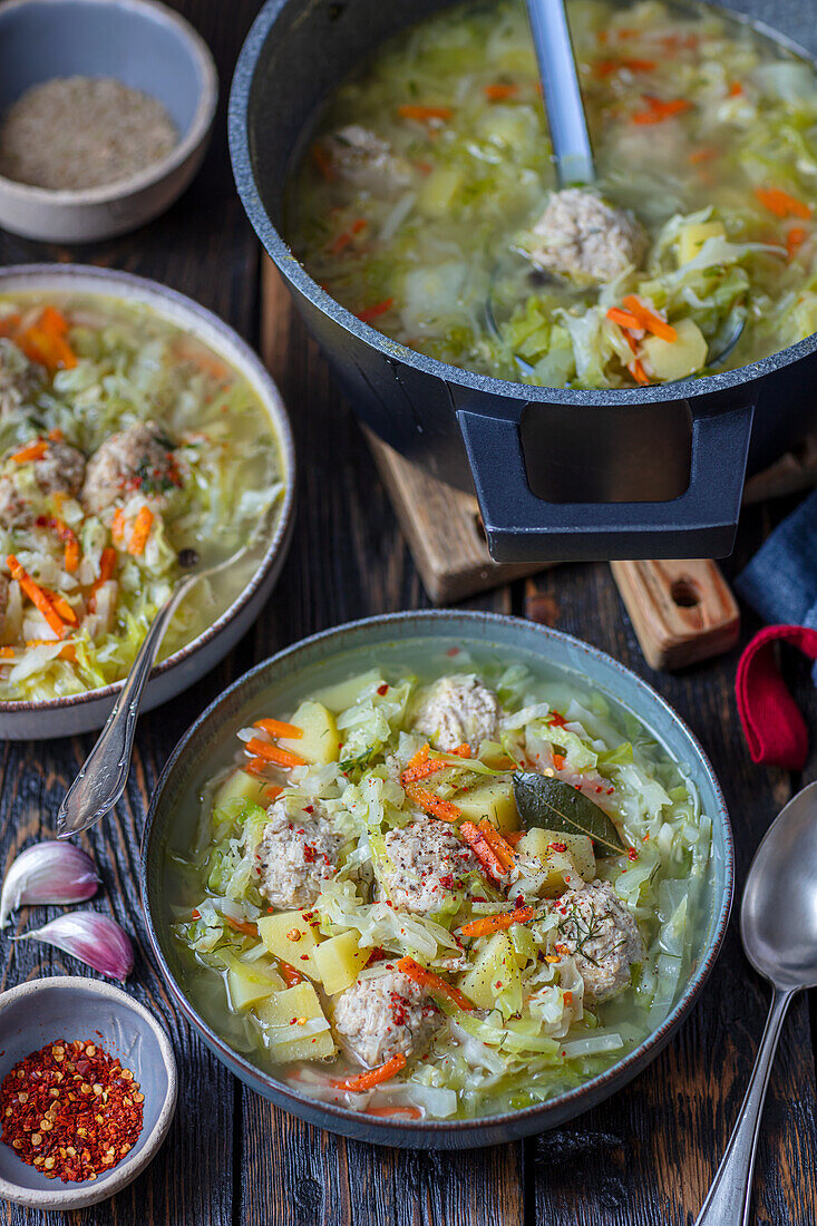 Cabbage soup with meatballs and potatoes