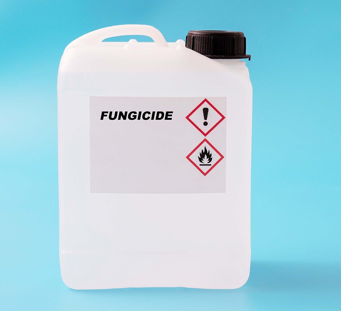 Fungicide in a plastic canister, conceptual image