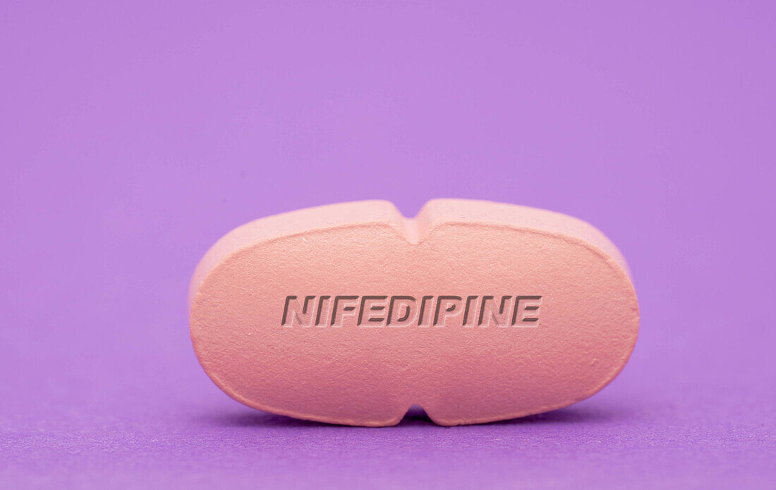 Nifedipine pill, conceptual image