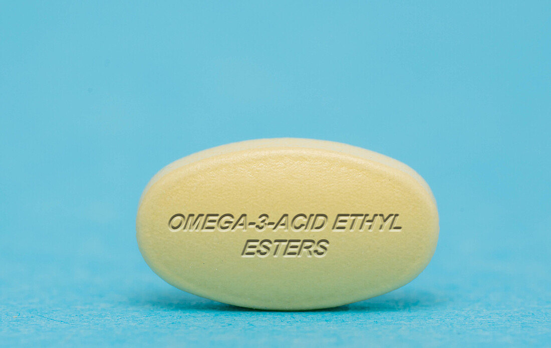 Omega-3-acid ethyl esters pill, conceptual image