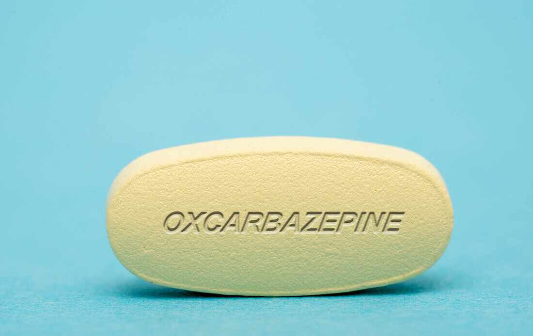 Oxcarbazepine pill, conceptual image