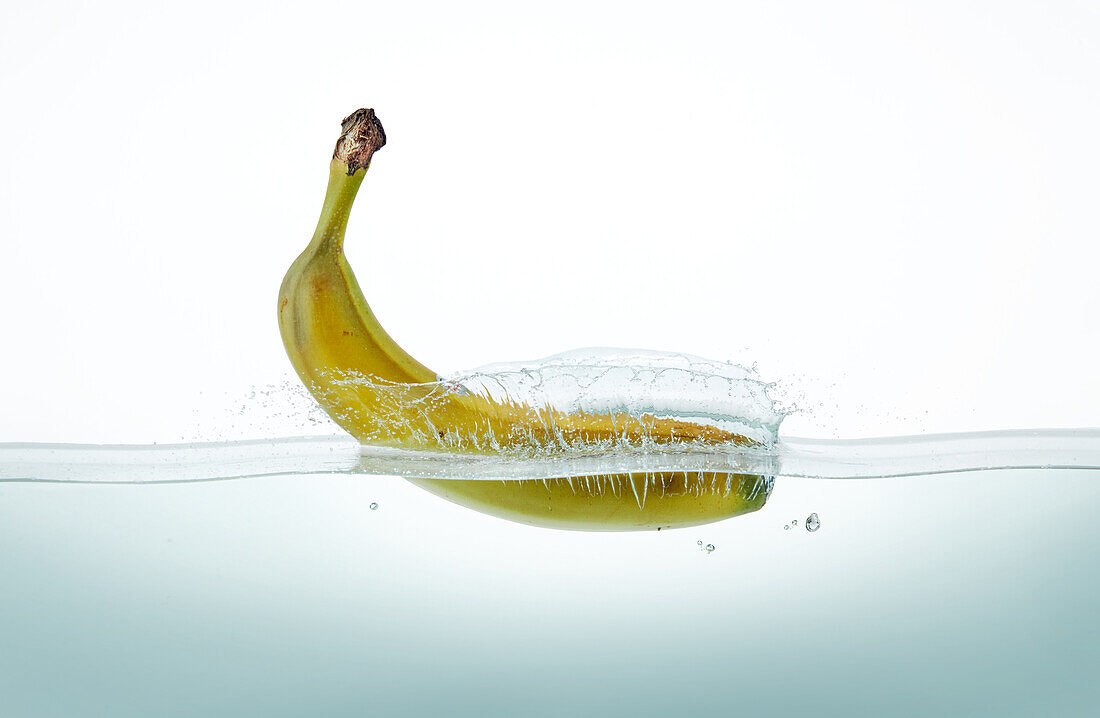 Banana splashing in water
