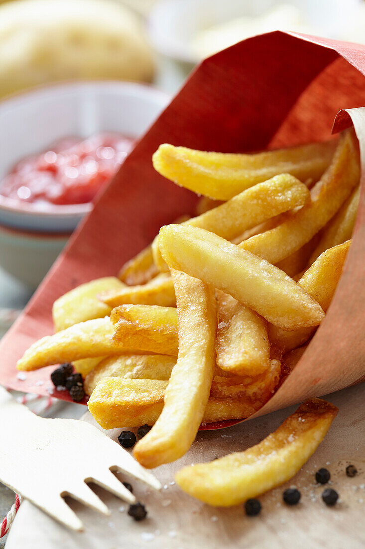 French fries with wooden fork