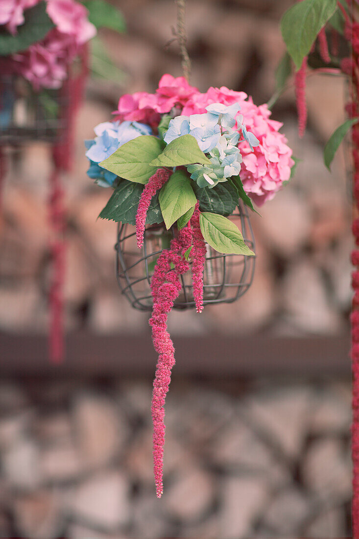 Hanging vase with hydrangea