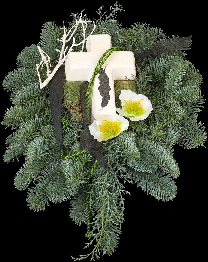 Arrangement with ceramic cross