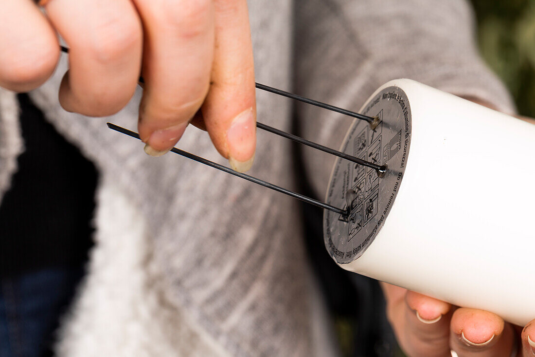 Drilling wire into candle