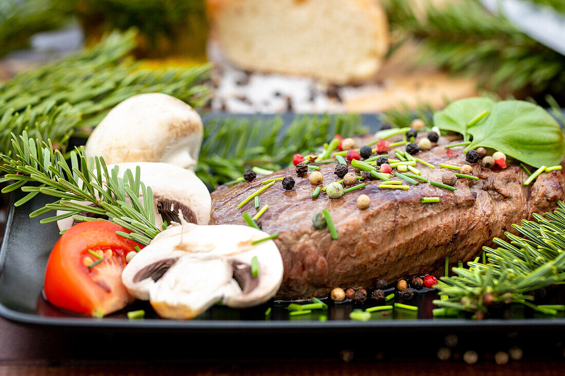 Steak with pine needles