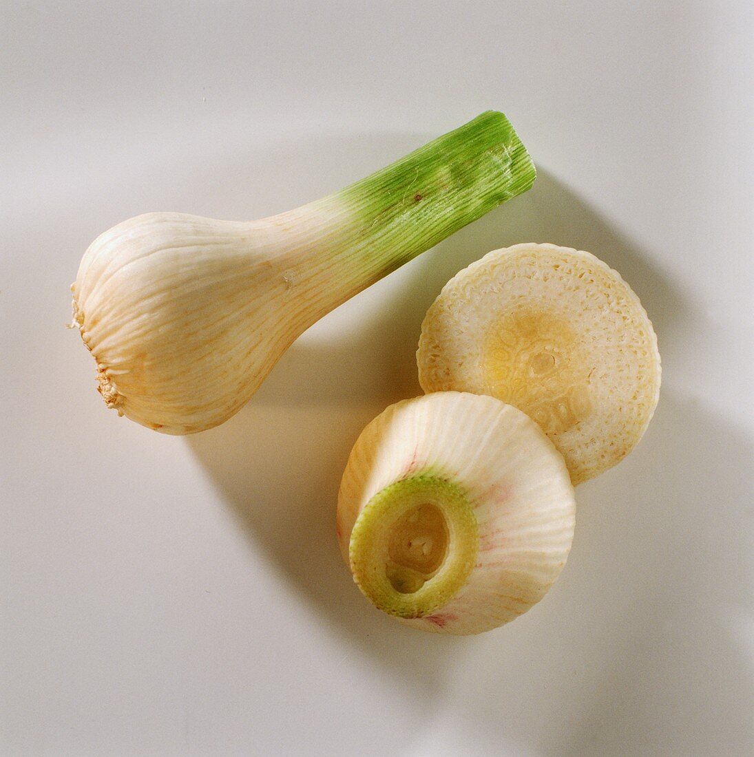 Young garlic, whole and halved bulb