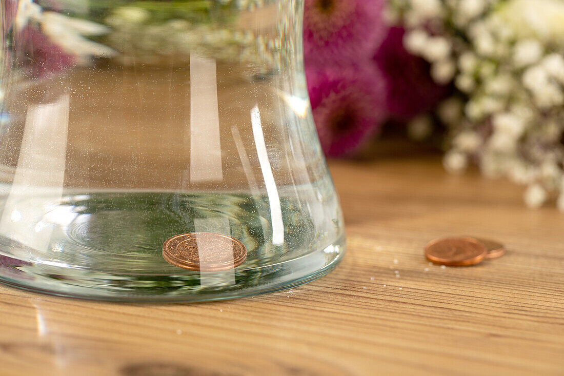 Cent piece in vase