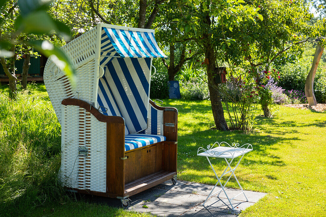 Beach chair in garden ambience