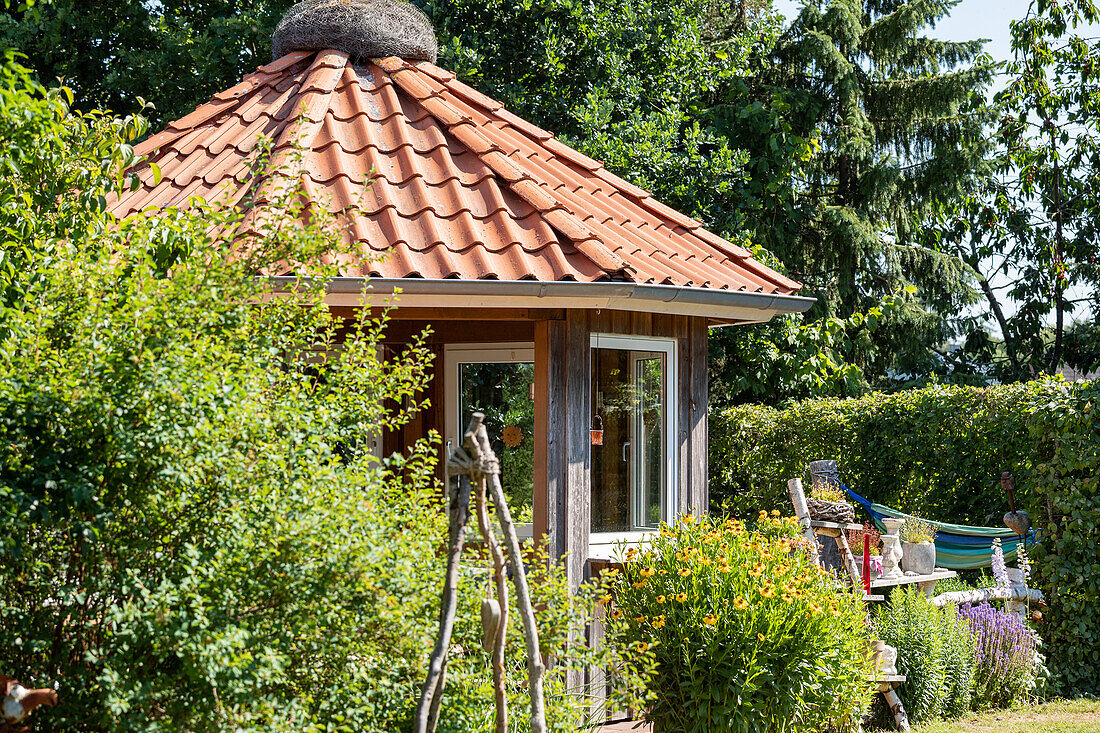 Wooden pavilion in the garden