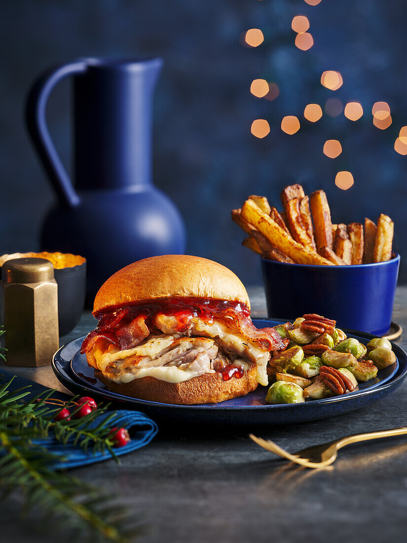 Chicken cheeseburger with Brussels sprouts and chips