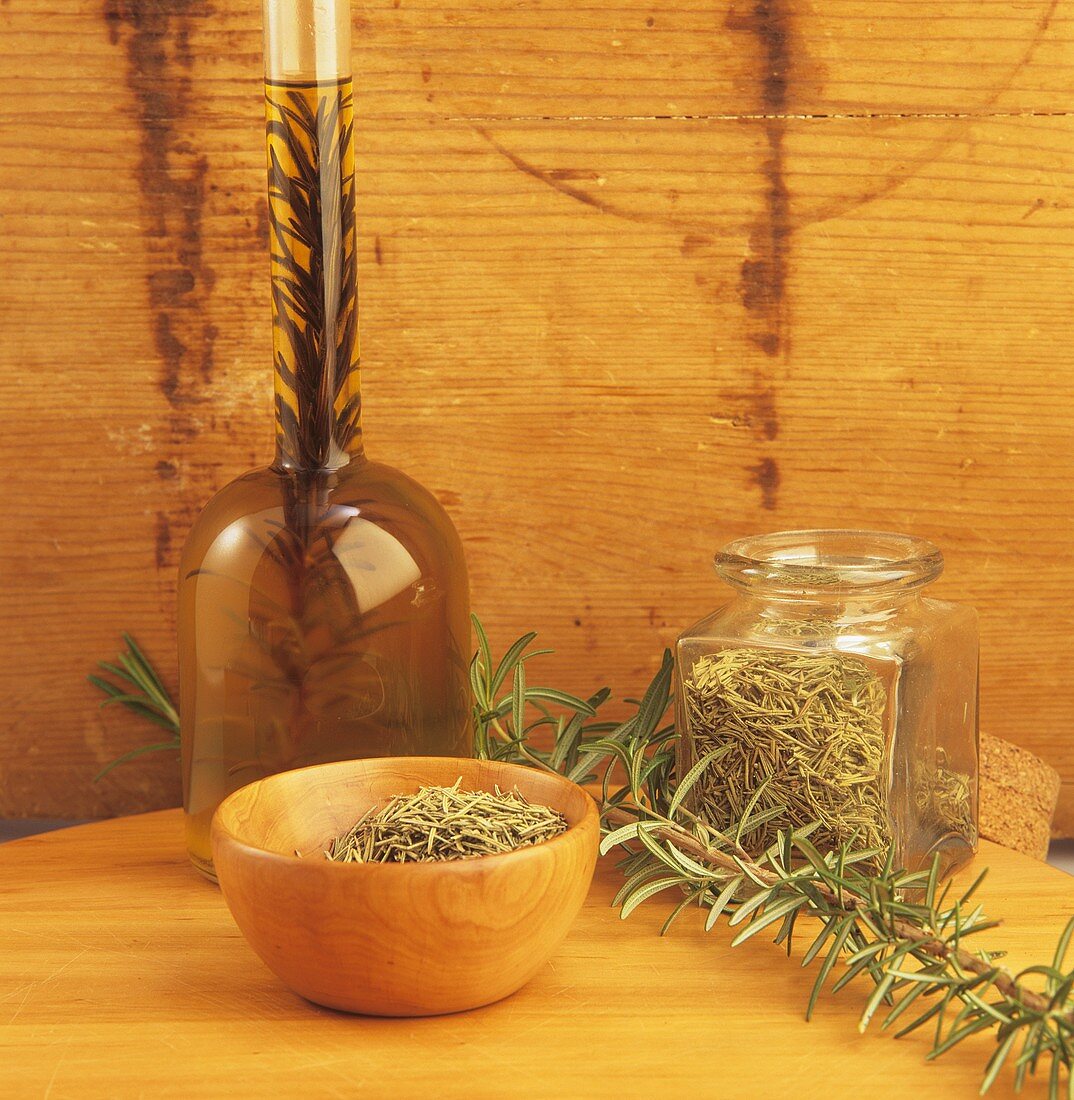 Dried rosemary, sprig of fresh rosemary and rosemary oil