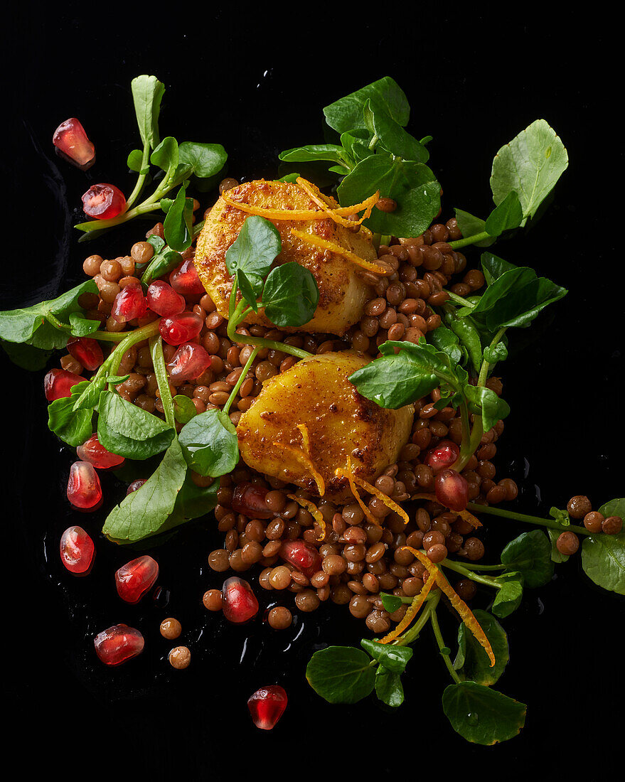 Scallops with lentils and pomegranate