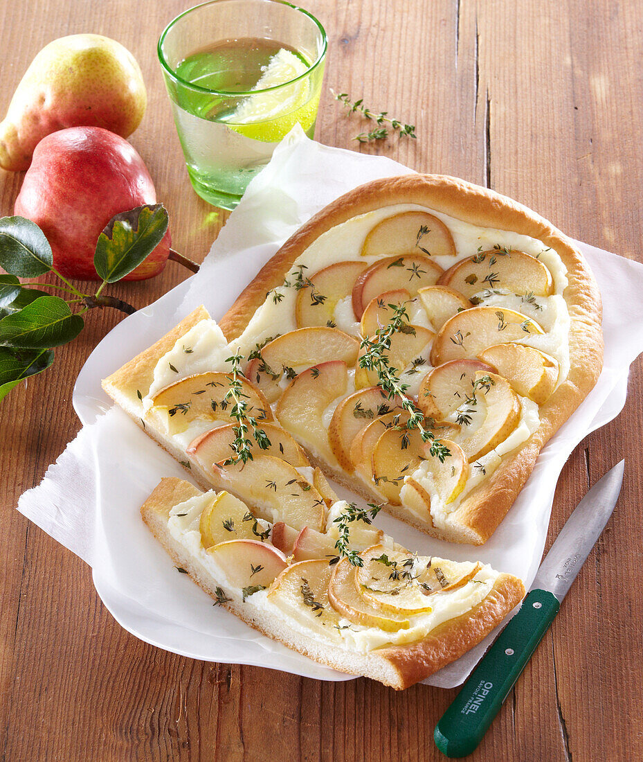 Sweet pear pizza with cream cheese, honey and thyme